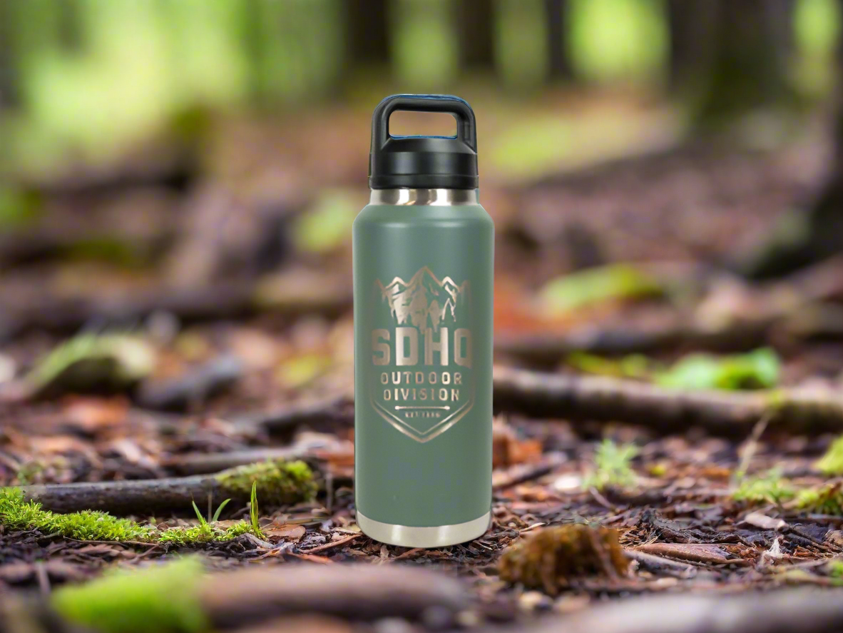 Green water bottle with black lid on a white background