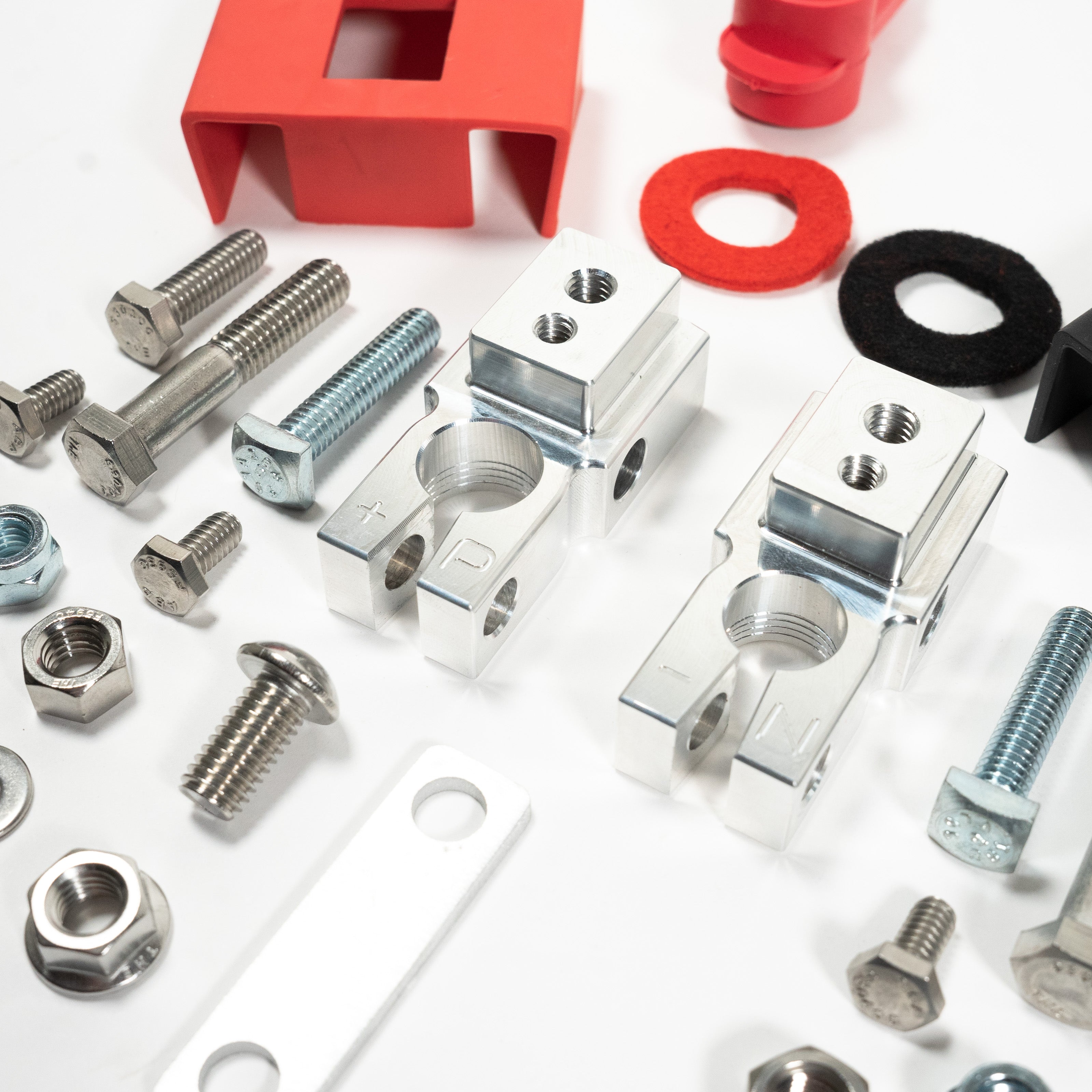 '20-22 Ford F250/350 SDHQ Built Billet Single Battery Terminal Kit close-up display of included parts and hardware