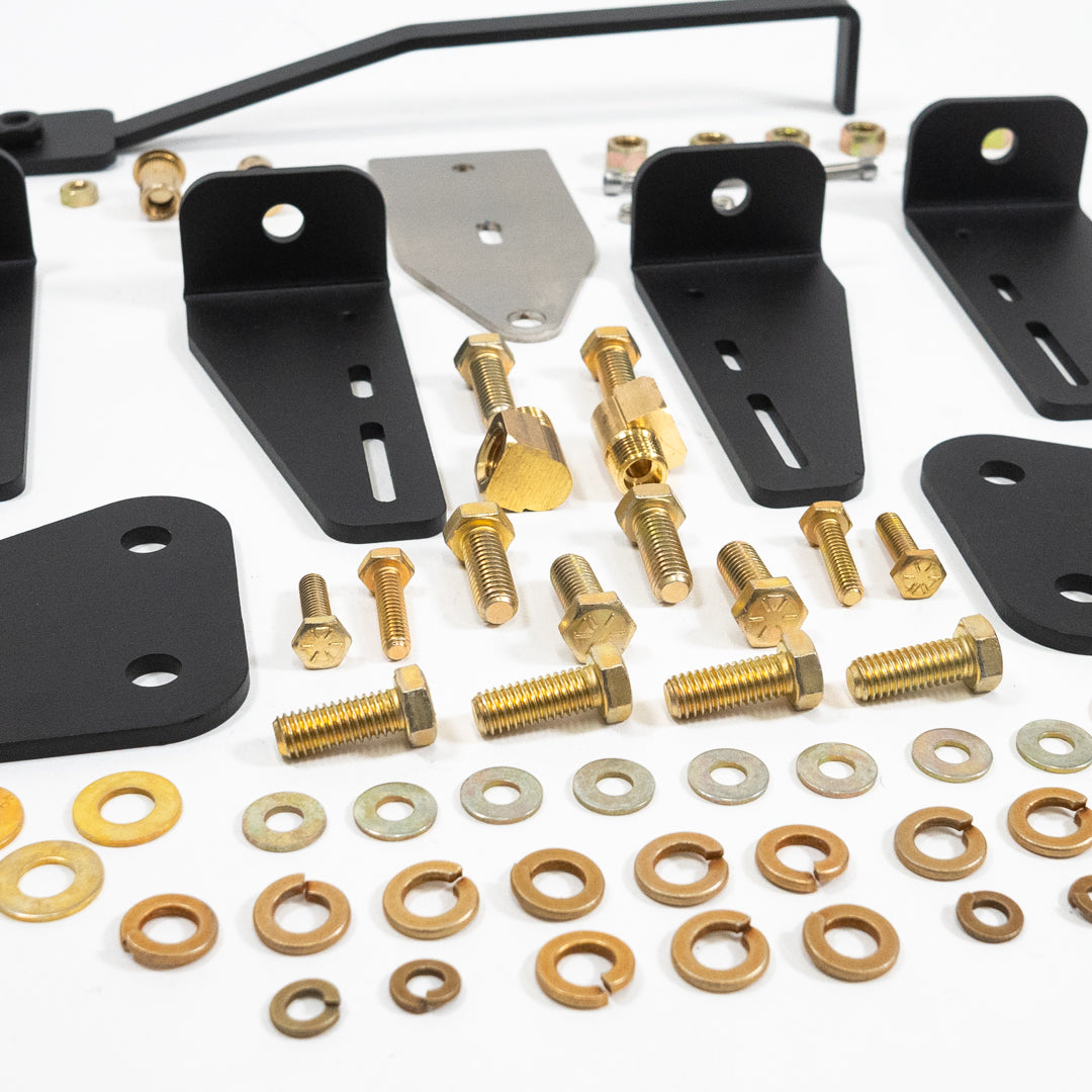 '17-24 F250/F350 Under-Bed Air Compressor Mounting Kit - Retains Spare Tire close-up display of included parts and hardware