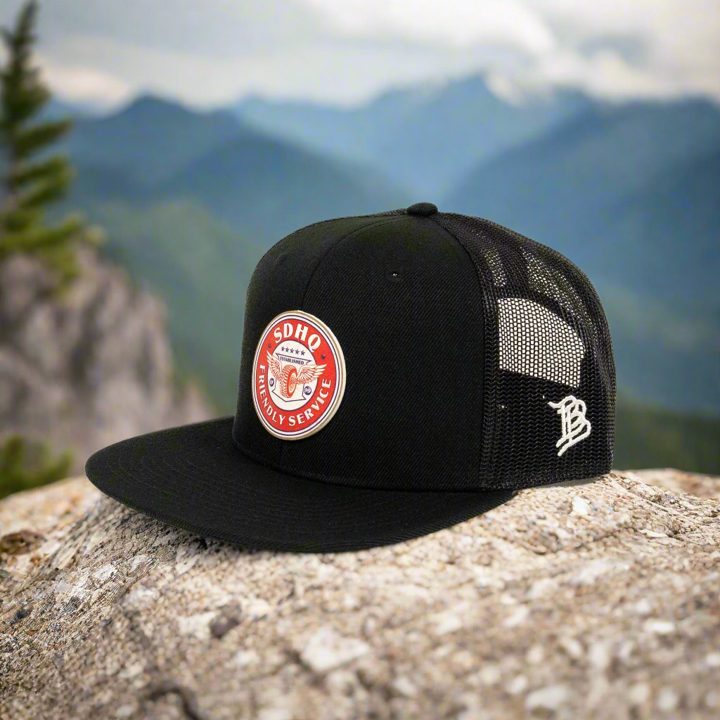 Flat Bill Trucker Hat w/ PVC Friendly Service Patch Angled Display