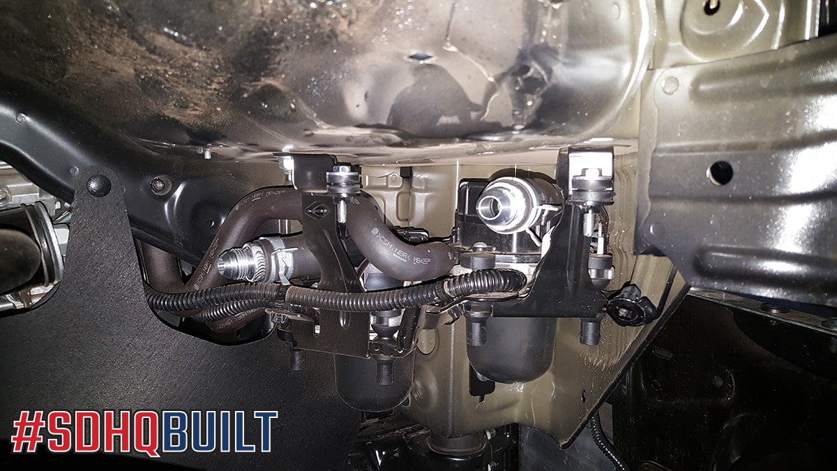 SDHQ Built Secondary Air Pump Intake Relocation Kit display Installed