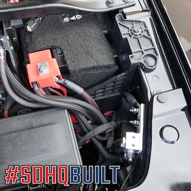 2025 Ram 1500 RHO SDHQ Built Billet Battery Terminal Kit installed with accessories wired to the terminals