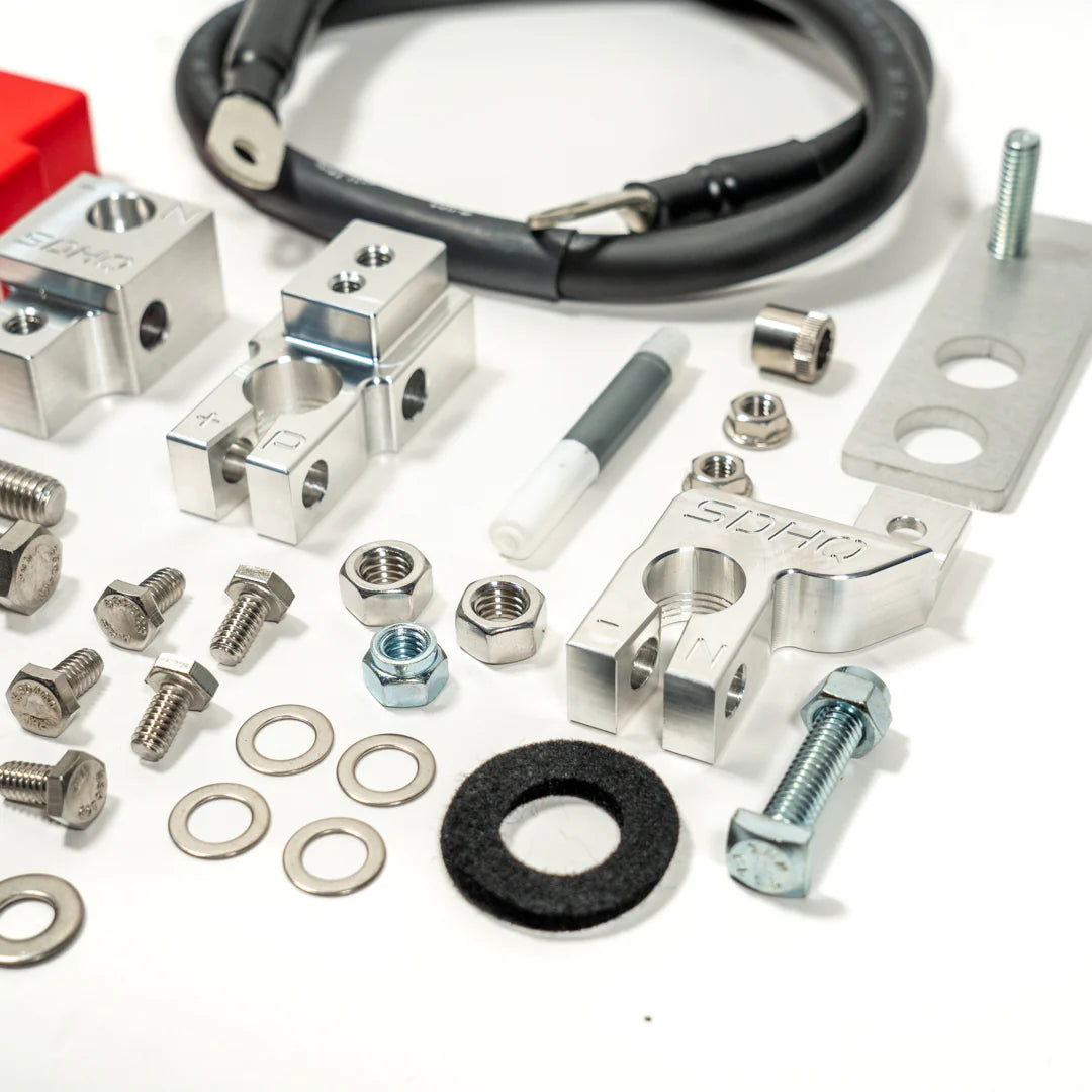 2025 Ram 1500 RHO SDHQ Built Billet Battery Terminal Kit close up of negative sensor terminal Display of Included Parts and Hardware