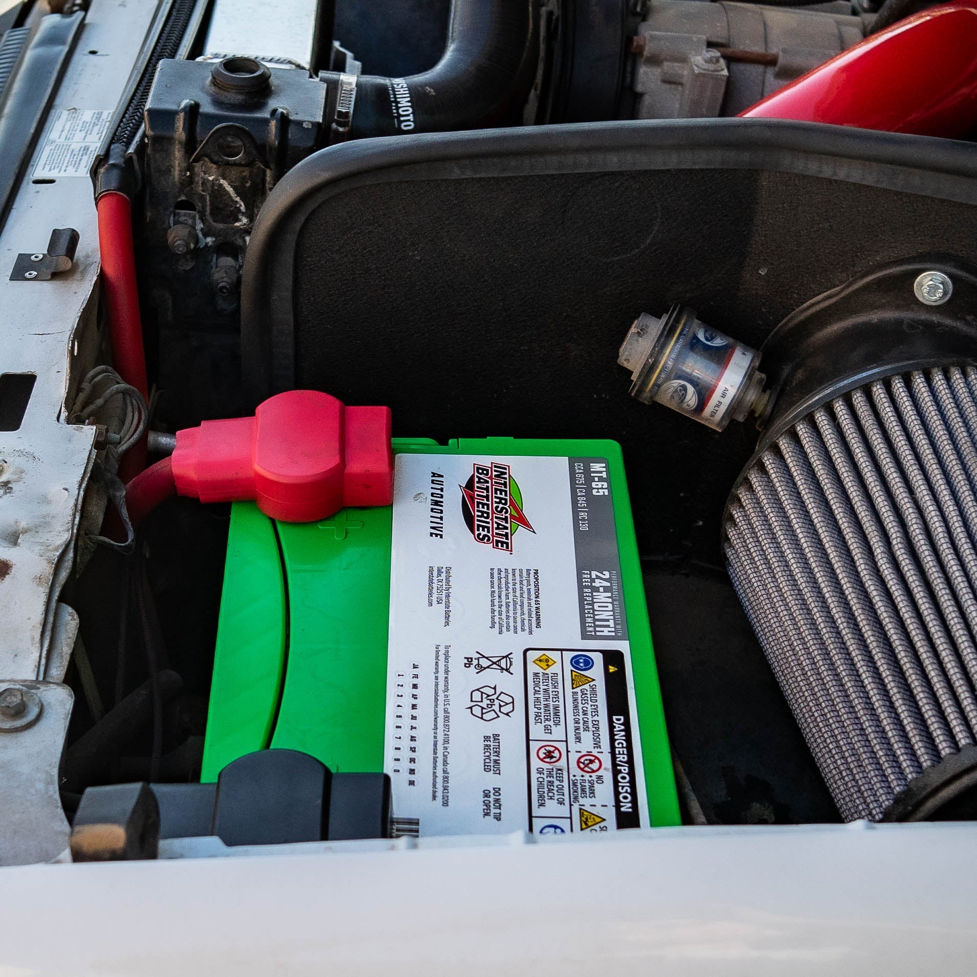 SDHQ Built '95-02.5 Ford 7.3L F250/F350/Superduty Billet Battery Terminal Upgrade Kit close-up display installed