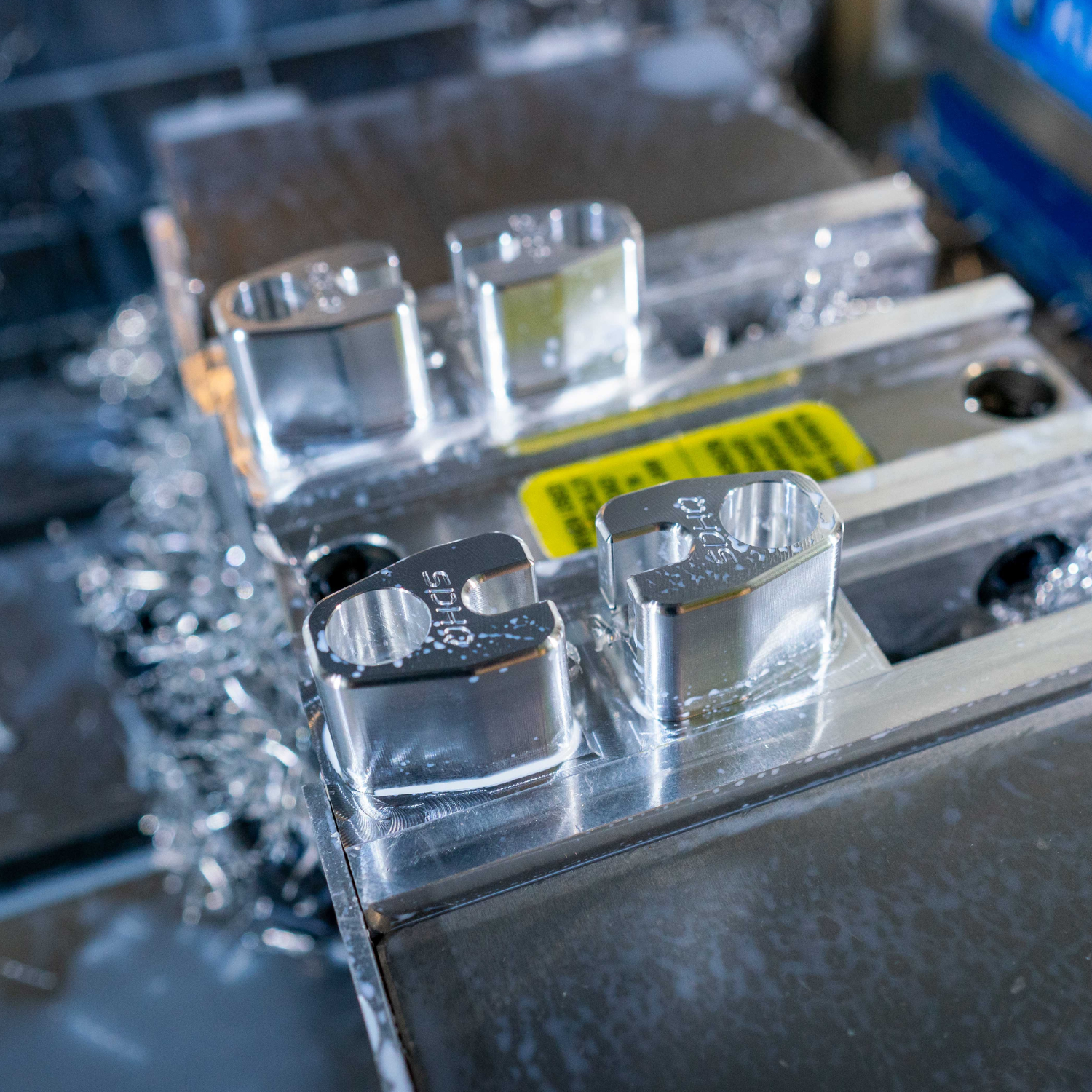 GX550 SDHQ Built Billet Front ABS Guards display of guards being produced in machine from billet aluminum block
