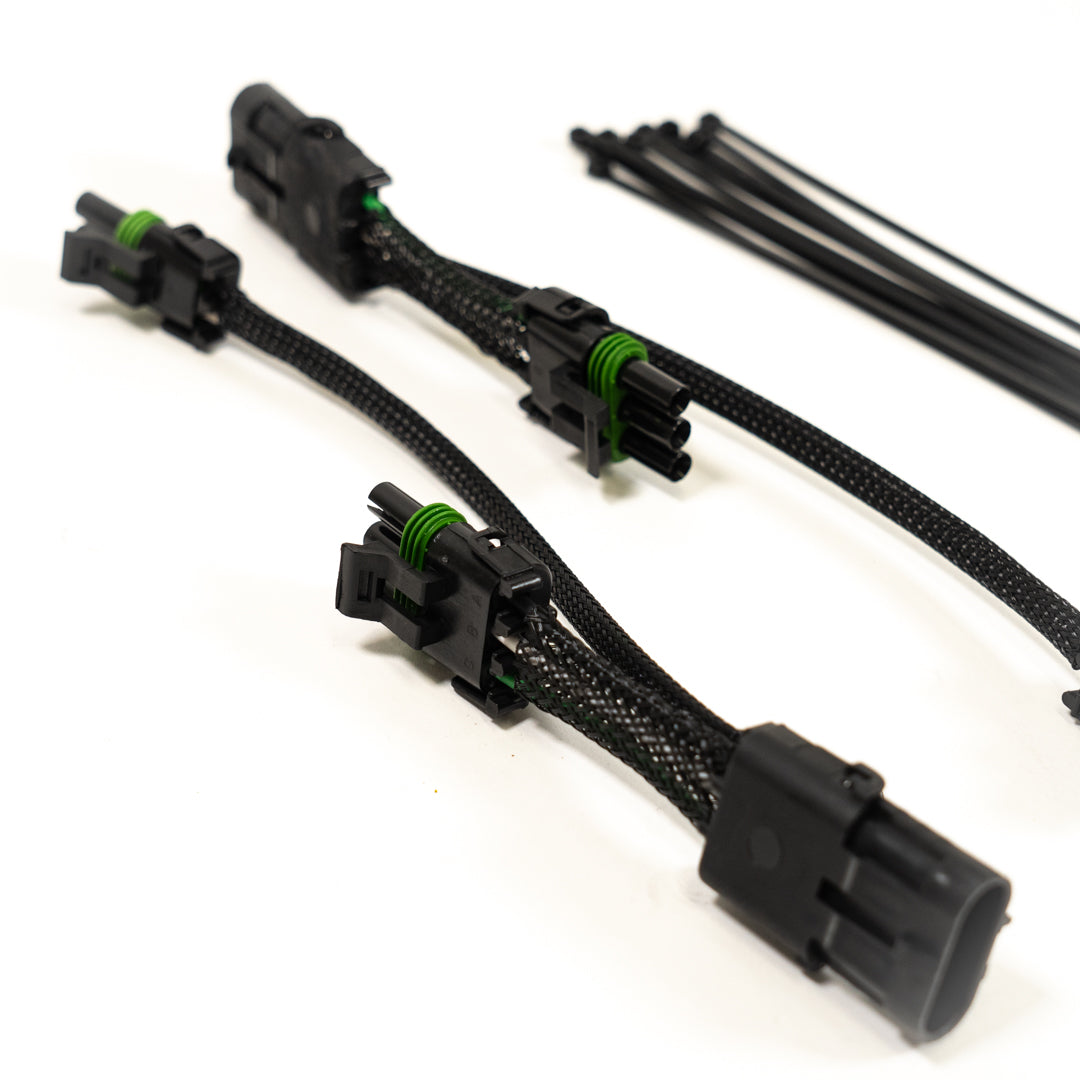 SDHQ Built Add-a-Light Baja Designs XL-Series Splitter Harness close-up display of included parts 