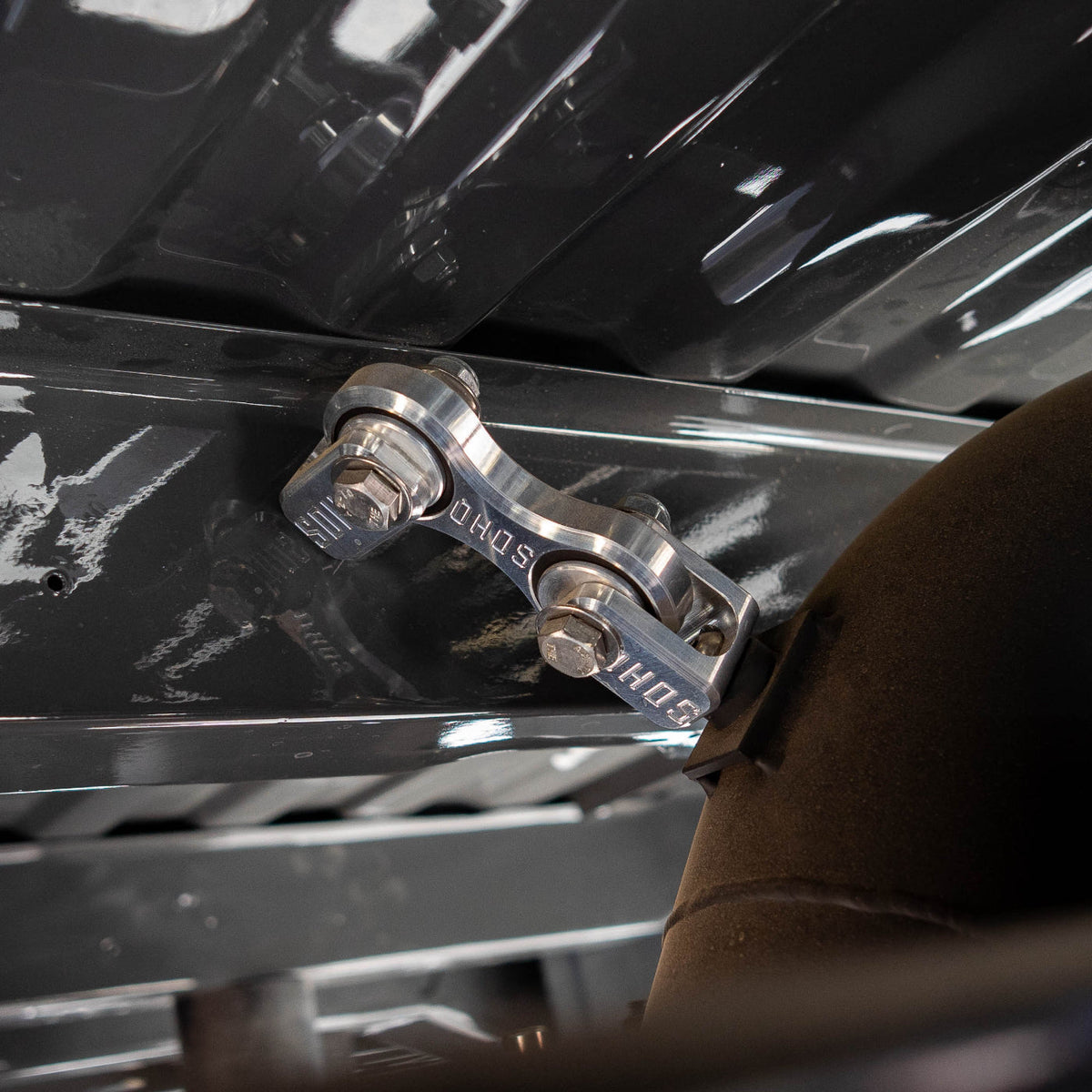 SDHQ Built Billet Exhaust Hanger Clevis Bracket installed