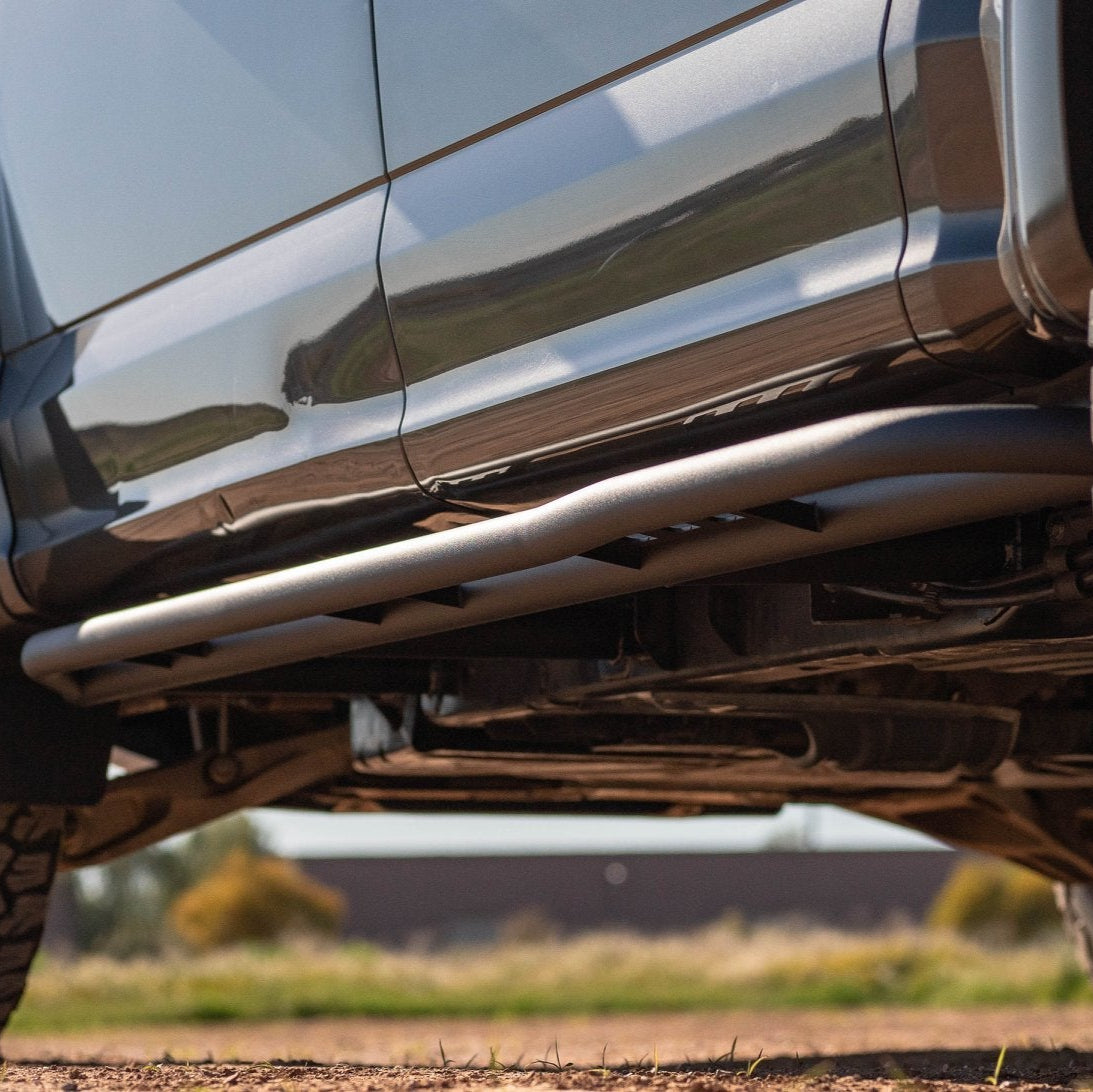 '15-23 Ford F150 Super Crew SDHQ Built Weld-On Rock Sliders close-up display installed 