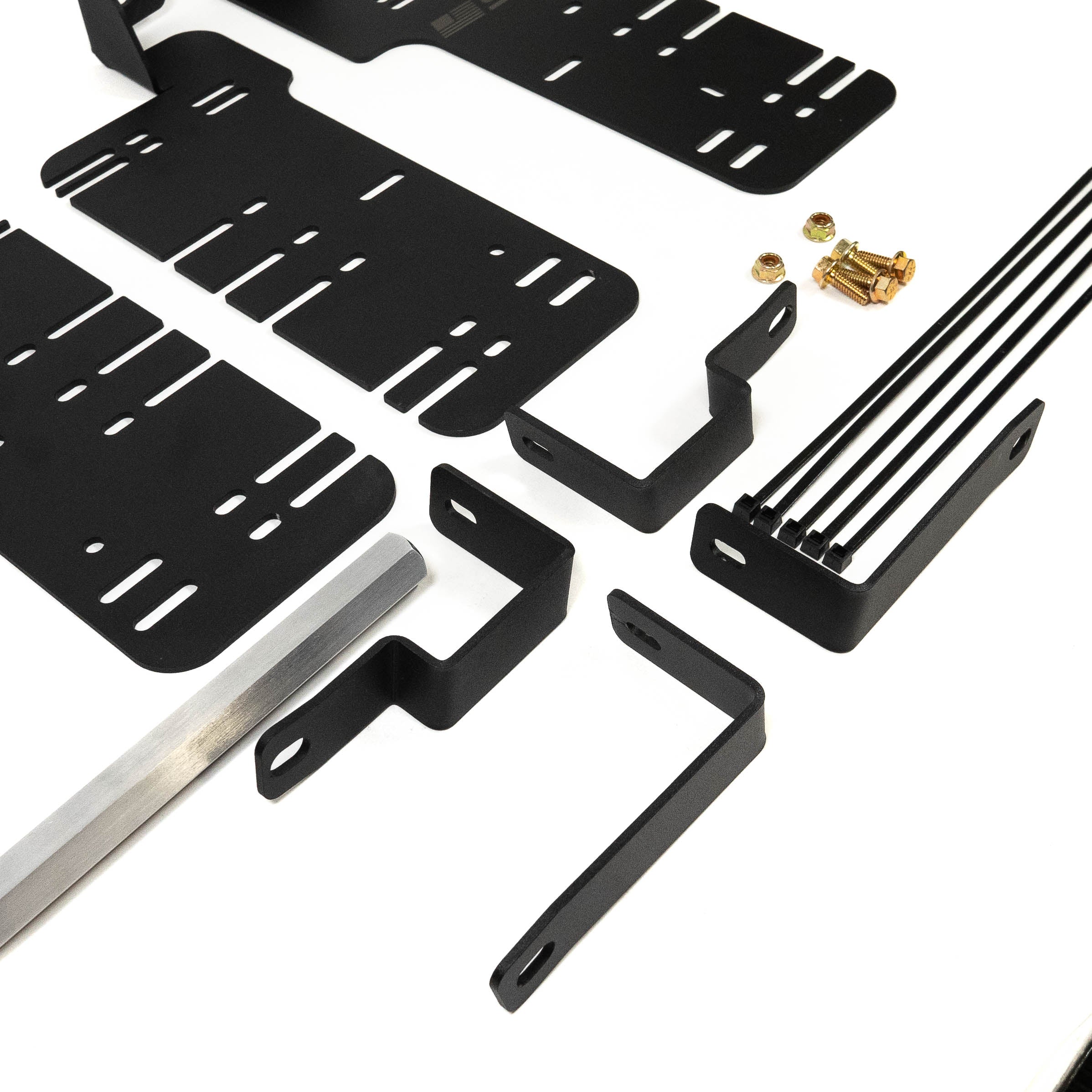SDHQ Built '21-24 F150 / Raptor Behind the Grille Light Mounting Kit close-up display of included parts and hardware 