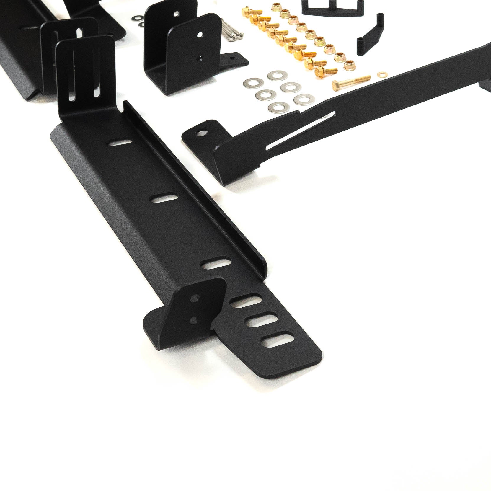 SDHQ Built '24-25 Tacoma Behind The Grille Pod Light Mounting Kit close-up display of included parts and hardware 