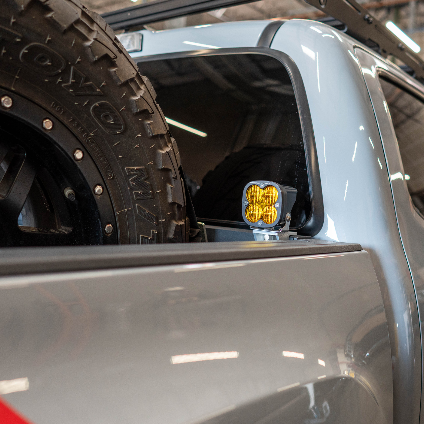 SDHQ BUILT BILLET CHASE LIGHT MOUNT INSTALLED ON SDHQ TACOMA DISPLAY