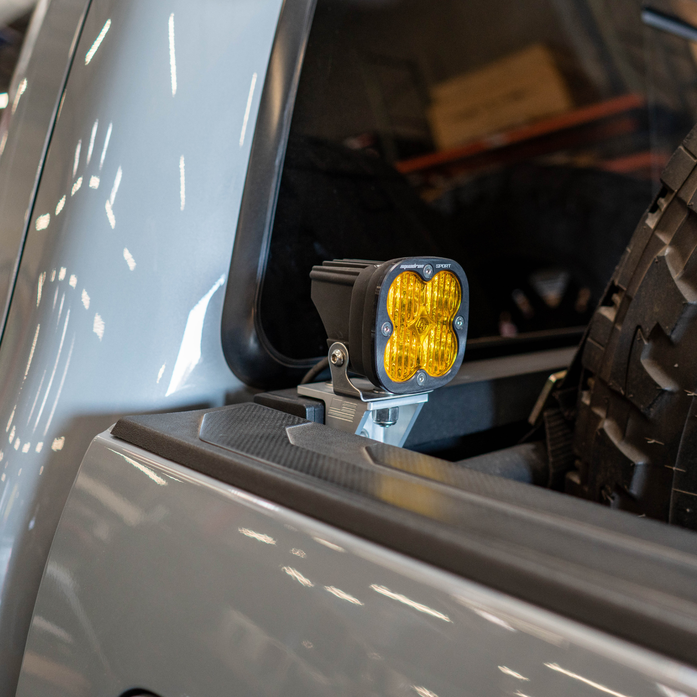 SDHQ BUILT BILLET CHASE LIGHT MOUNT INSTALLED ON SDHQ TACOMA DISPLAY