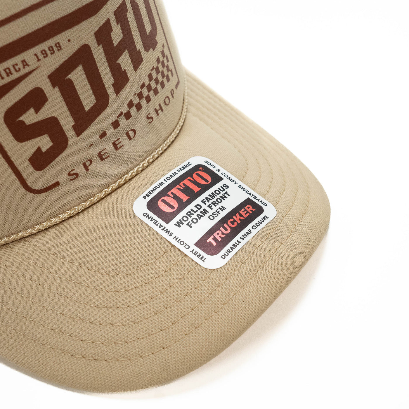 SDHQ Speed Shop Trucker Hat display of label from hat manufacturer of series of hat