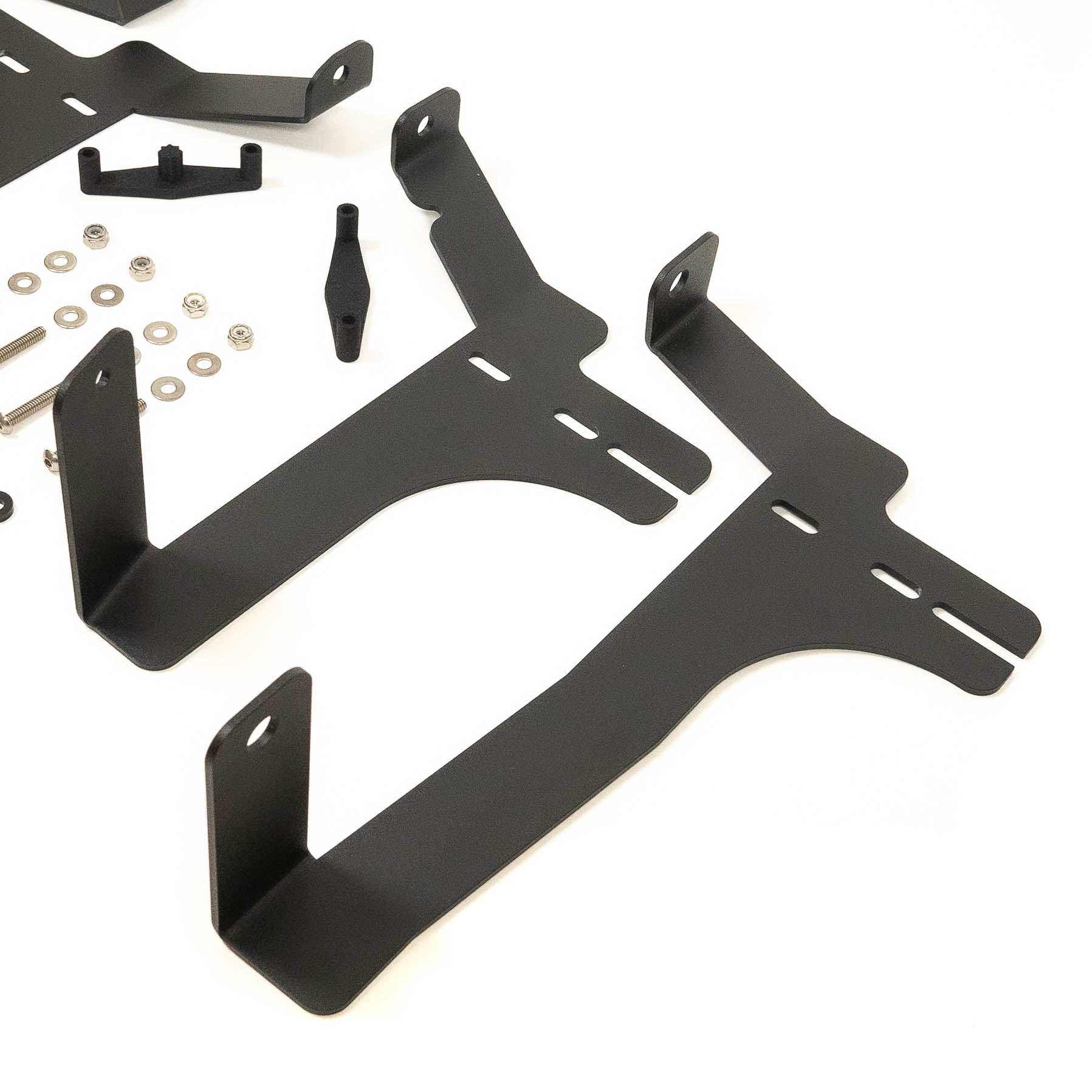 '24 Tacoma SR/SR5 Behind the Grille Light Mounting Kit Close-up display of included parts and hardware 