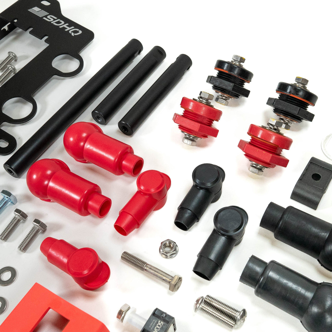 Tacoma SDHQ Built Power Solution Kit display of boots and copper core bushings