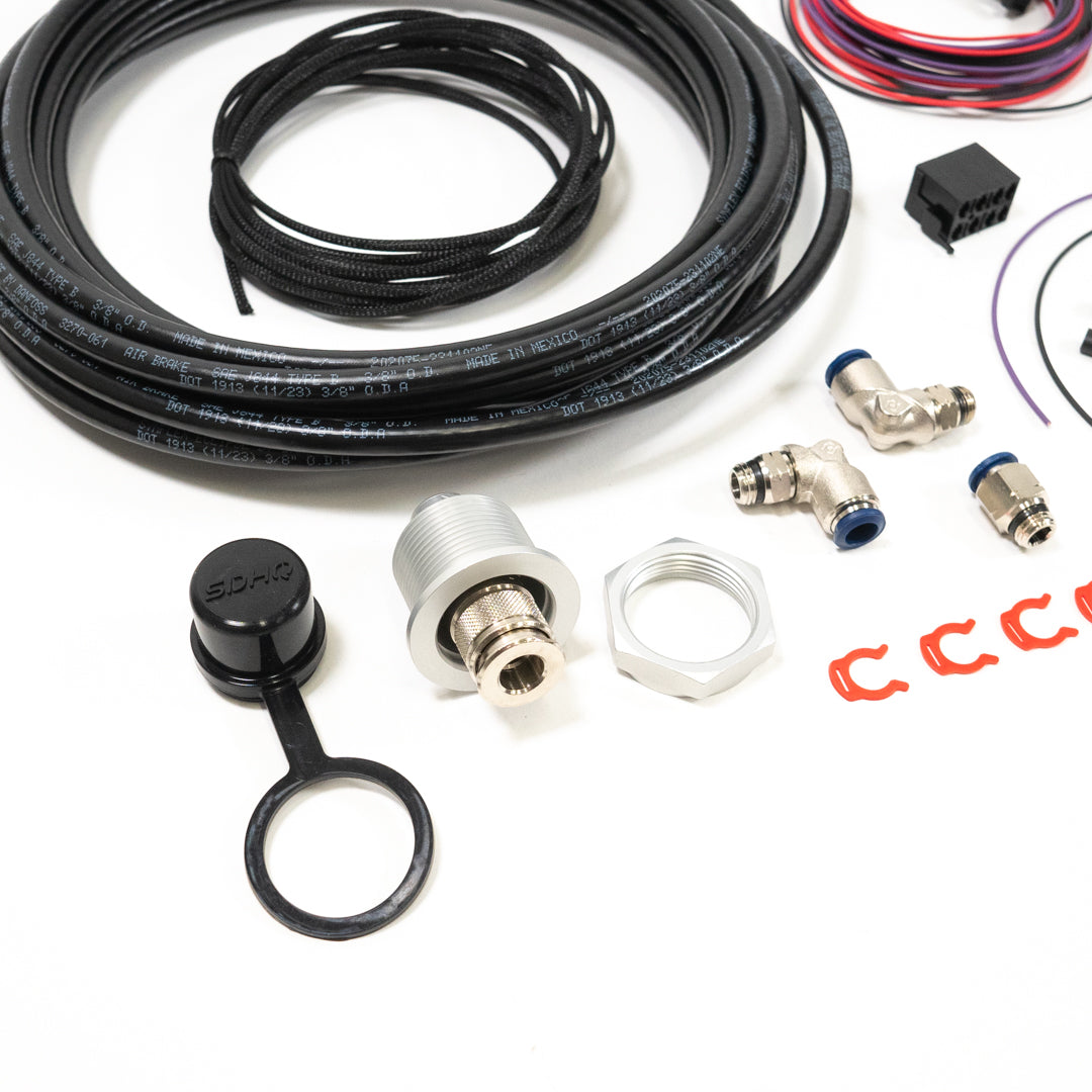'22-24 Tundra Bulkhead Air Chuck and Switch Mounting Kit close-up display of included parts 
